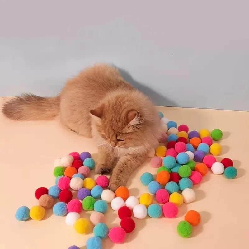 Lanceur de balle pour chat avec plusieurs balles en peluche